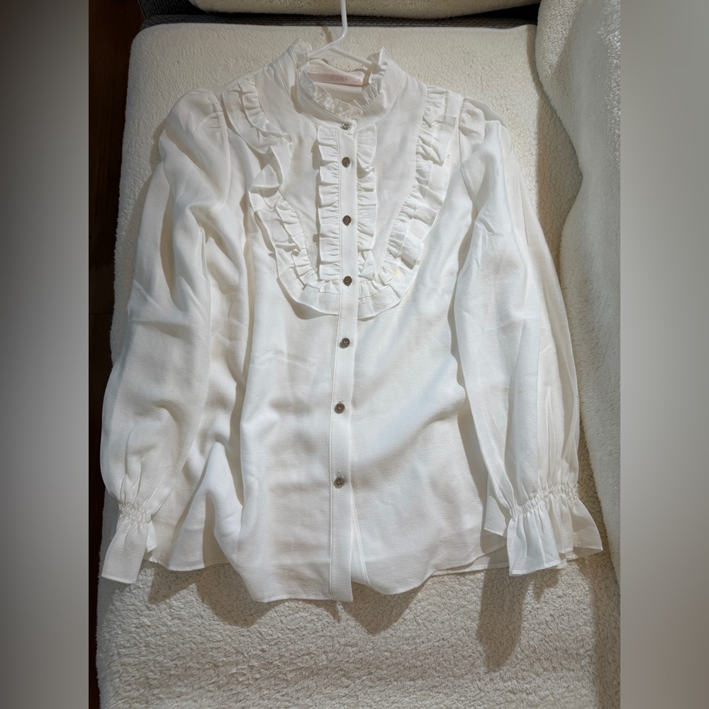 White Ruffled Button-Up Blouse